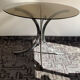 Round table in Italian smoked glass