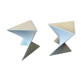 Pair of unmarked triangular white design stools