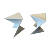 Pair of unmarked triangular white design stools