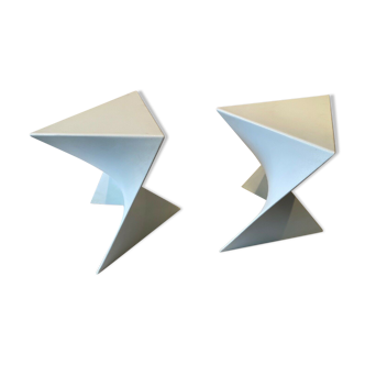Pair of unmarked triangular white design stools