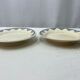 Pair of flat cut on foot faience white and blue