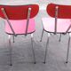 Red formica table and two chairs