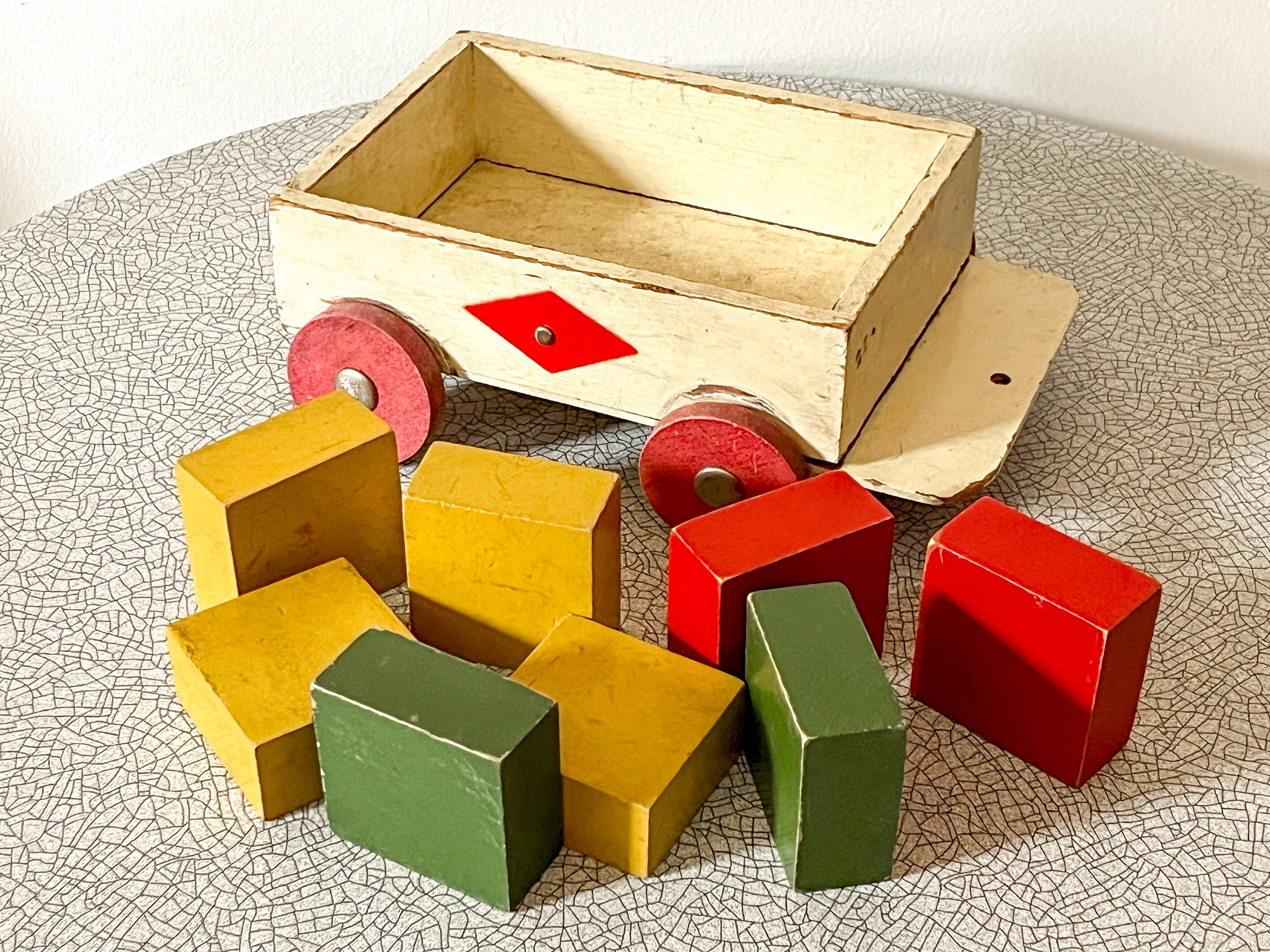 Wooden pull-along toy with coloured blocks, vintage toy.