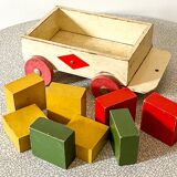 Wooden pull-along toy with coloured blocks, vintage toy.