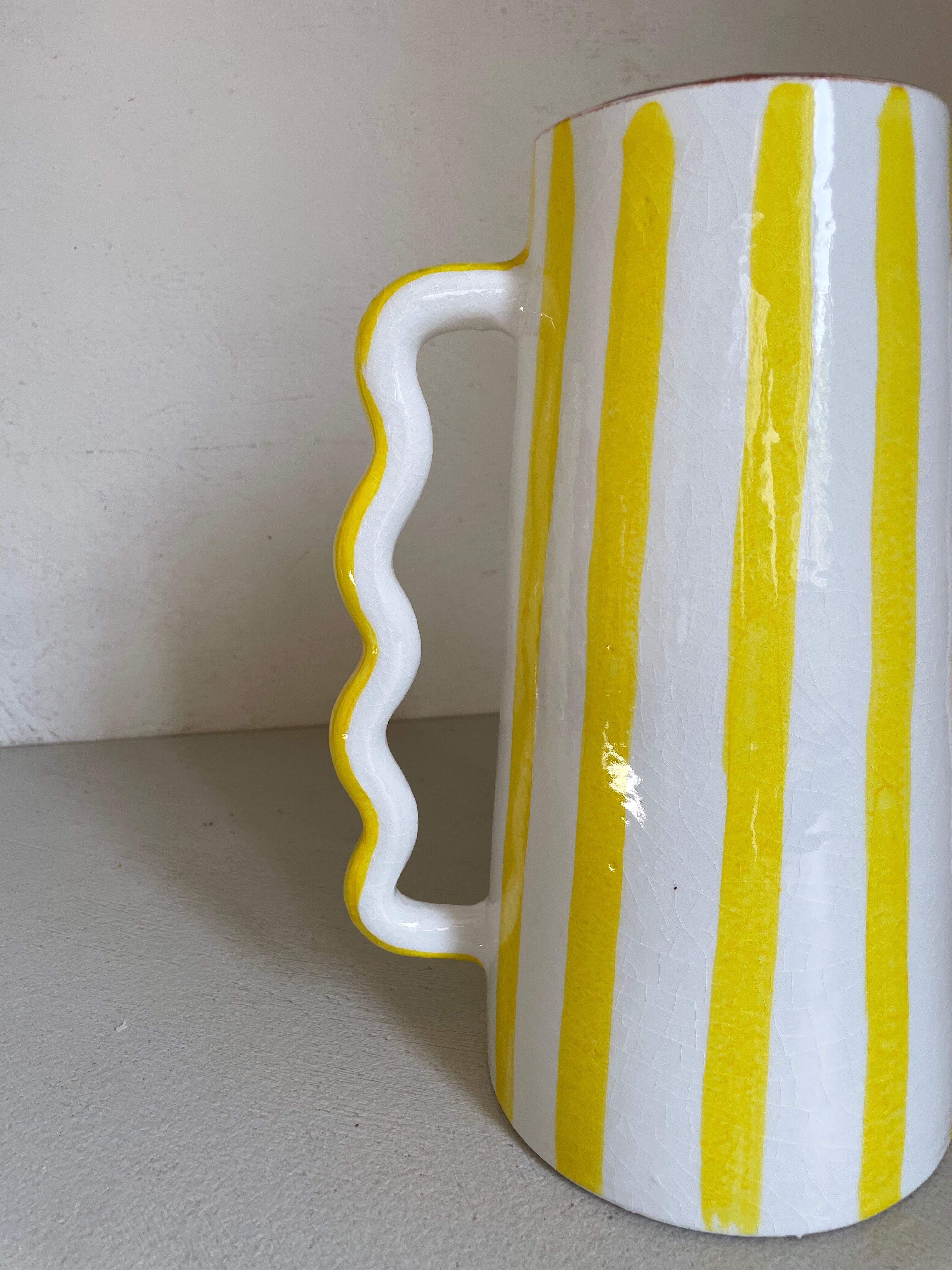 Lemon yellow and white striped ceramic vase with abstract wavy handmade handheld