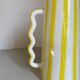 Lemon yellow and white striped ceramic vase with abstract wavy handmade handheld