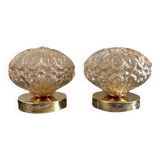 Set of two vintage amber glass wall lights