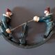 Vintage toy "Painted cast iron clown seesaw" from the 1930s