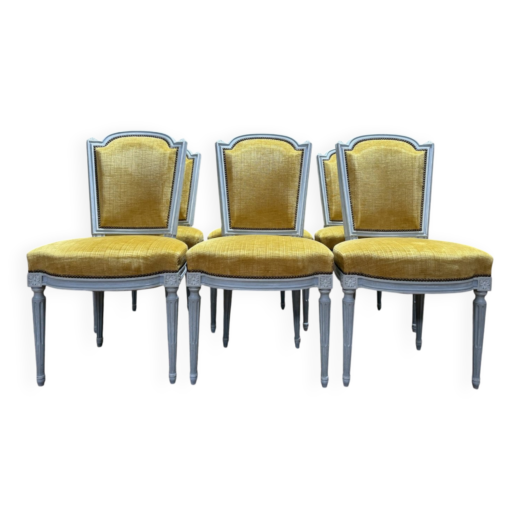 Set of 6 Louis XVI style chairs with polished wood and velvet.