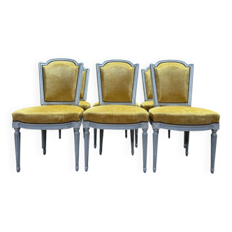 Set of 6 Louis XVI style chairs with polished wood and velvet.