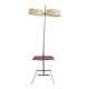 Brass and lacquered metal floor lamp with a wooden magazine shelf.
