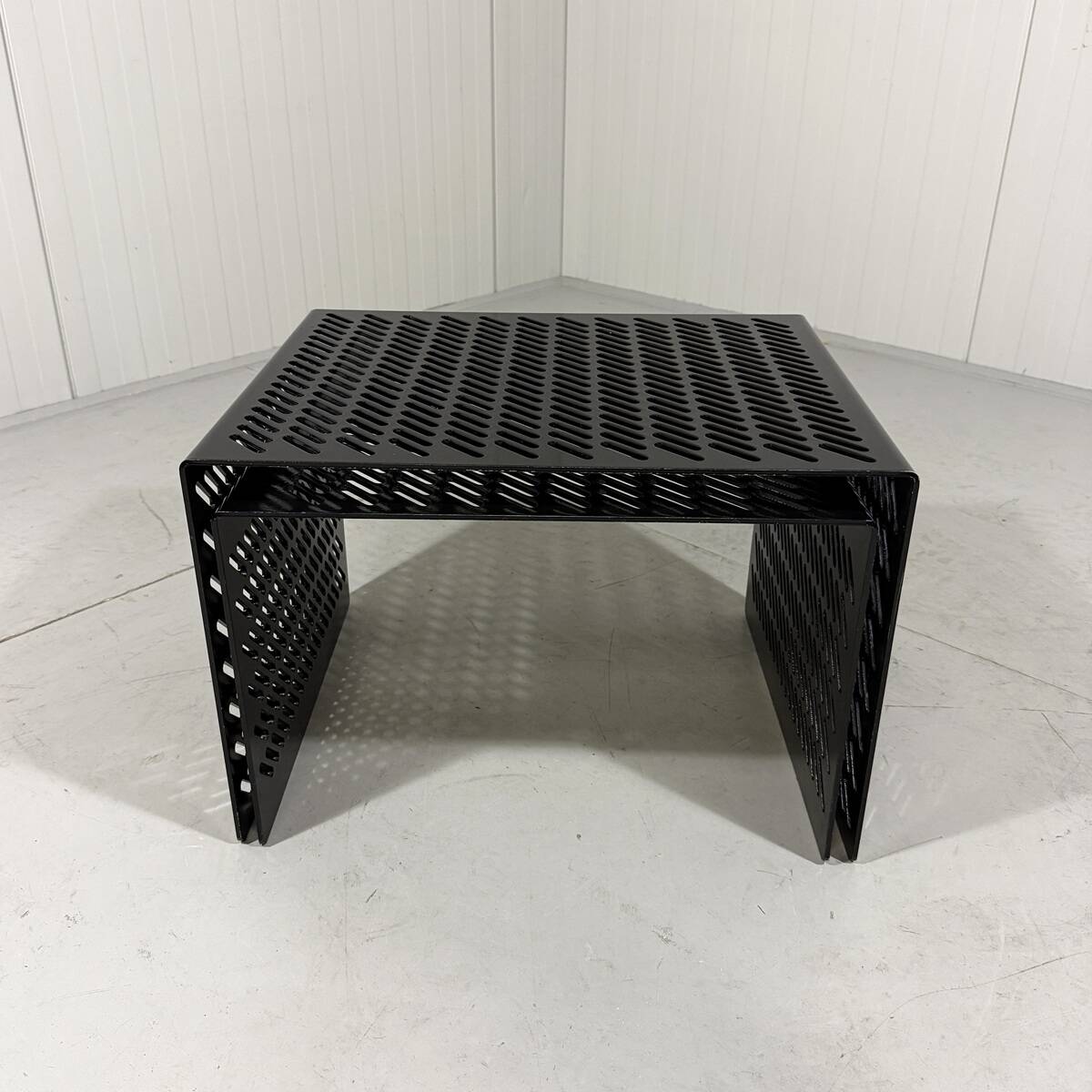 Black perforated steel nesting tables Italy 1980’s