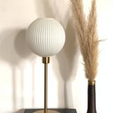 Table lamp with a lampshade from an old vintage pendant light in ribbed white glass and a pi