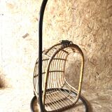Vintage rattan hanging chair with its stand.