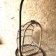 Fauteuil suspendu vintage en rotin avec sa potence