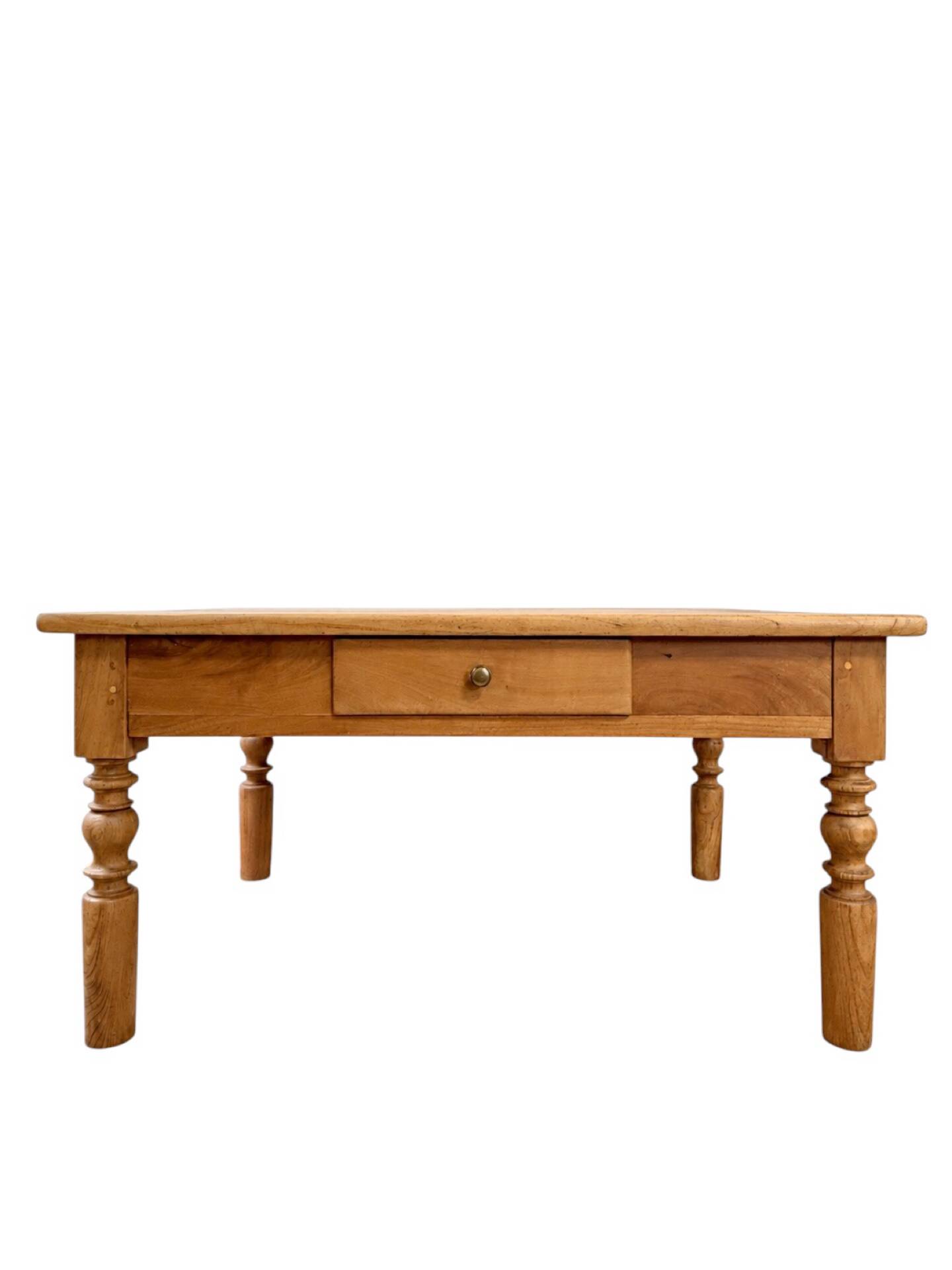 Antique coffee table in solid elm with turned legs.
