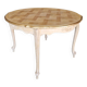 Round table made of cherry wood, sanded and varnished.