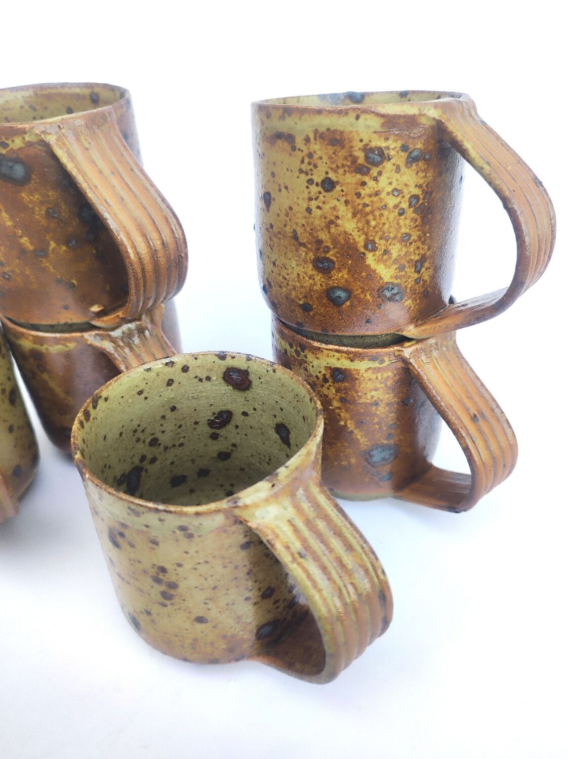 Cups + sandstone saucer by Puisaye Gaudry