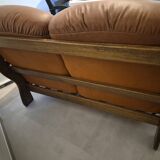 Vintage Scandinavian two-seater sofa in cognac leather and solid oak.