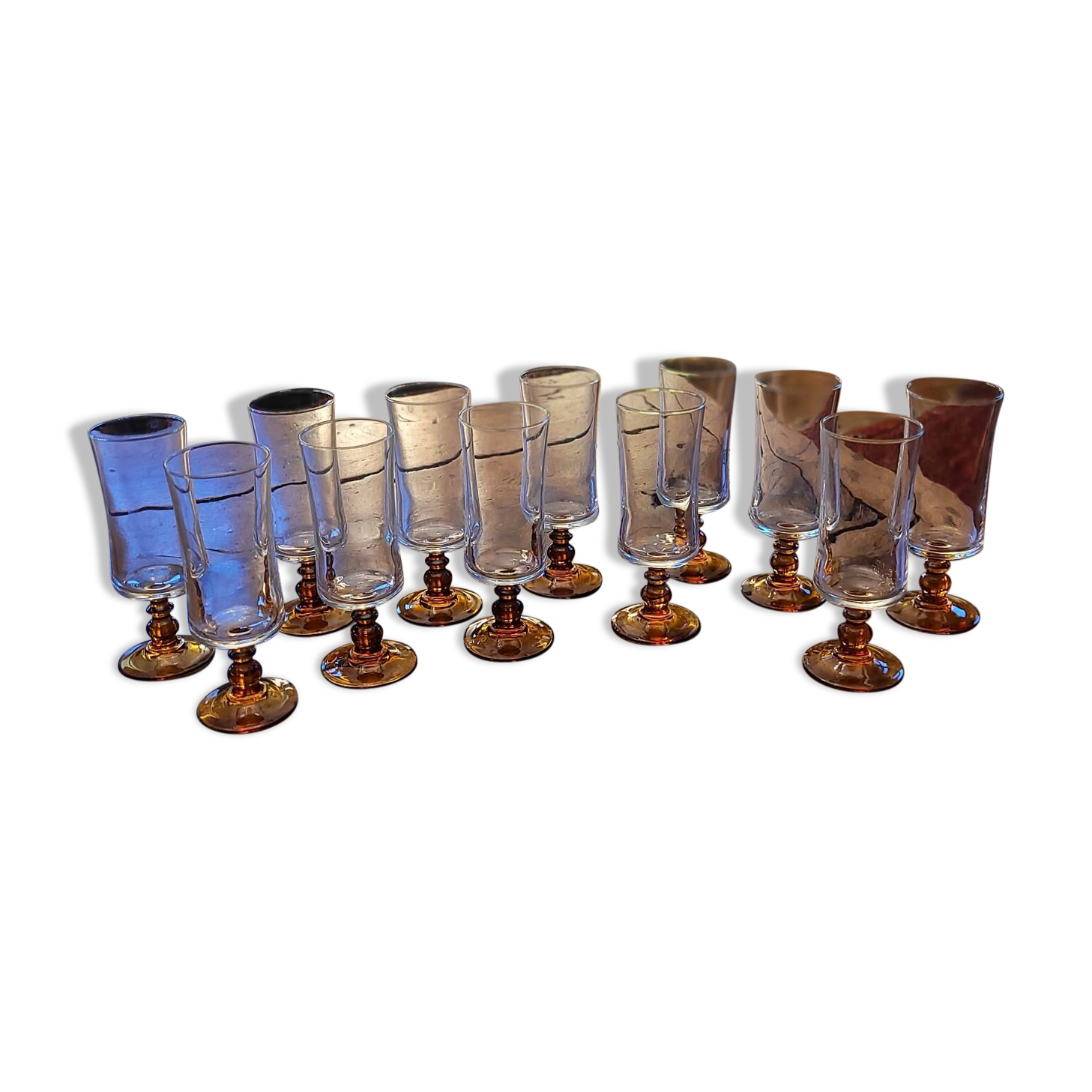 12 amber-stemmed flutes, 70s