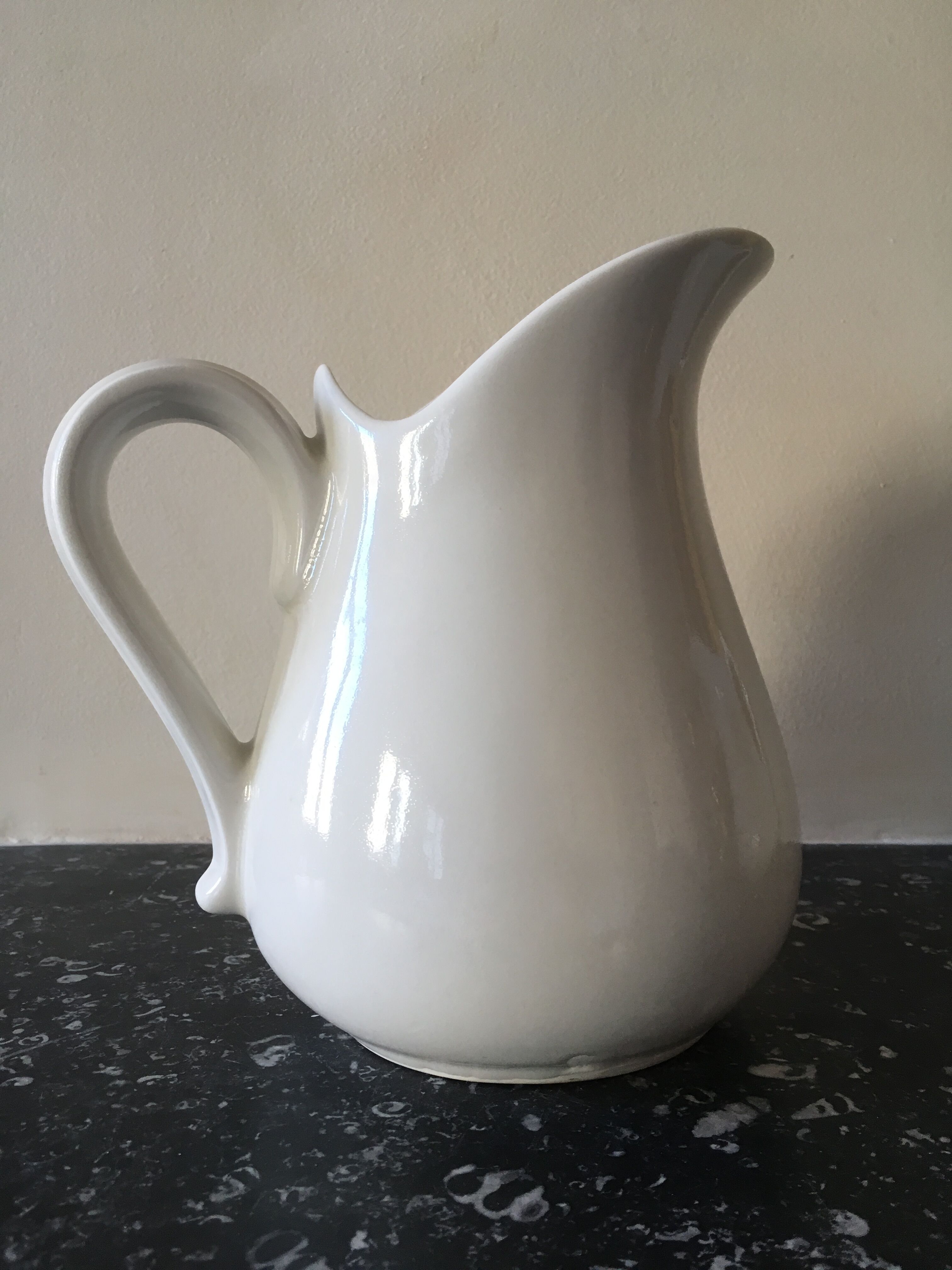 Broc in white fire porcelain with large spout