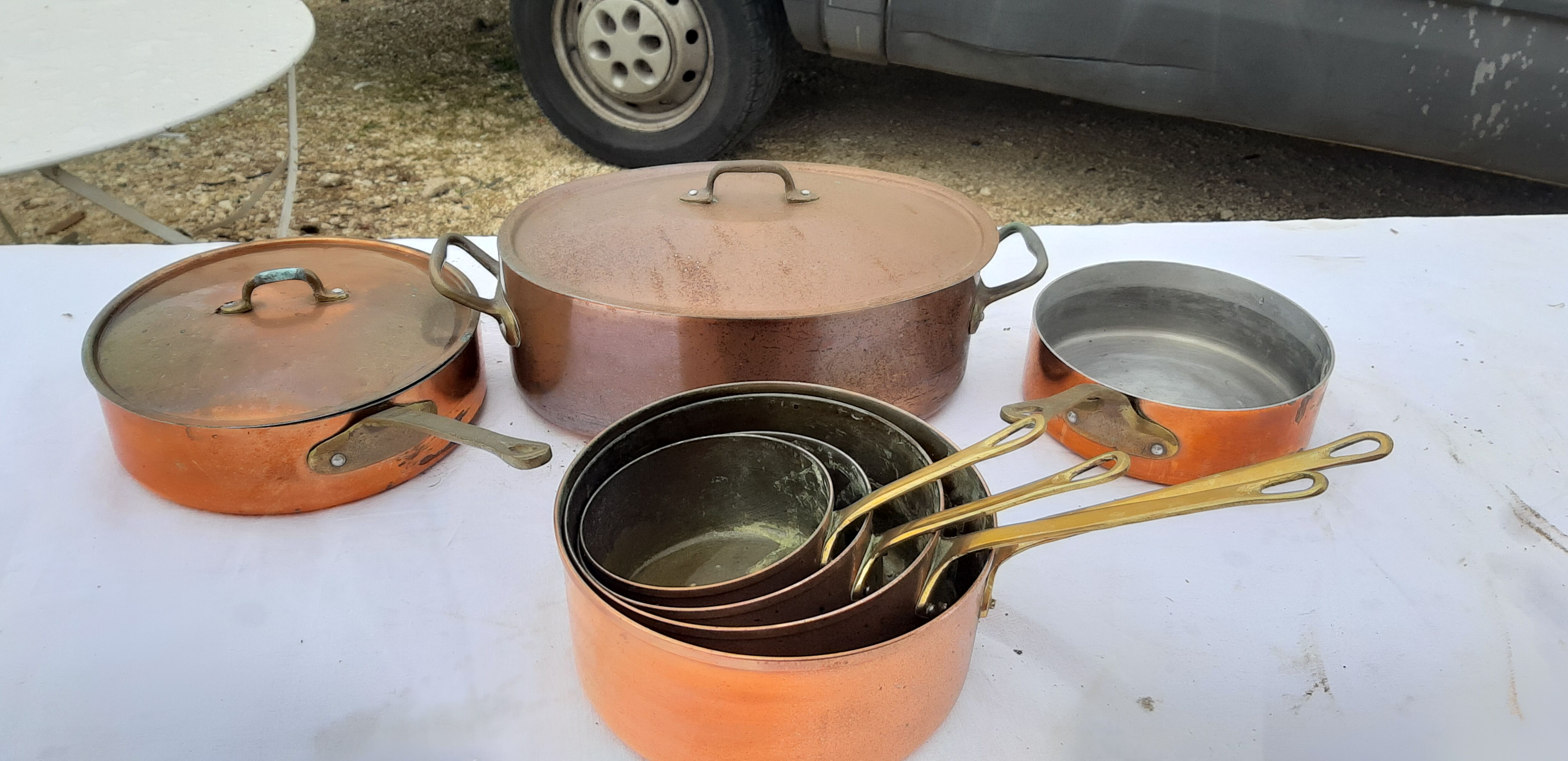 Lots of tinned copper kitchen utensils
