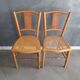 Pair of old caned chairs in blond wood