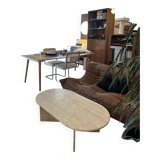 Oval coffee table in raw travertine