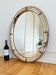 Vintage Spanish Venetian-style wall mirror, oval, brass, 1980s Hollywood Regency