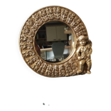 Shabby Chic round mirror. Putti/Cherub decor. Floral motifs. Dimensions: 20 x 20 cm.