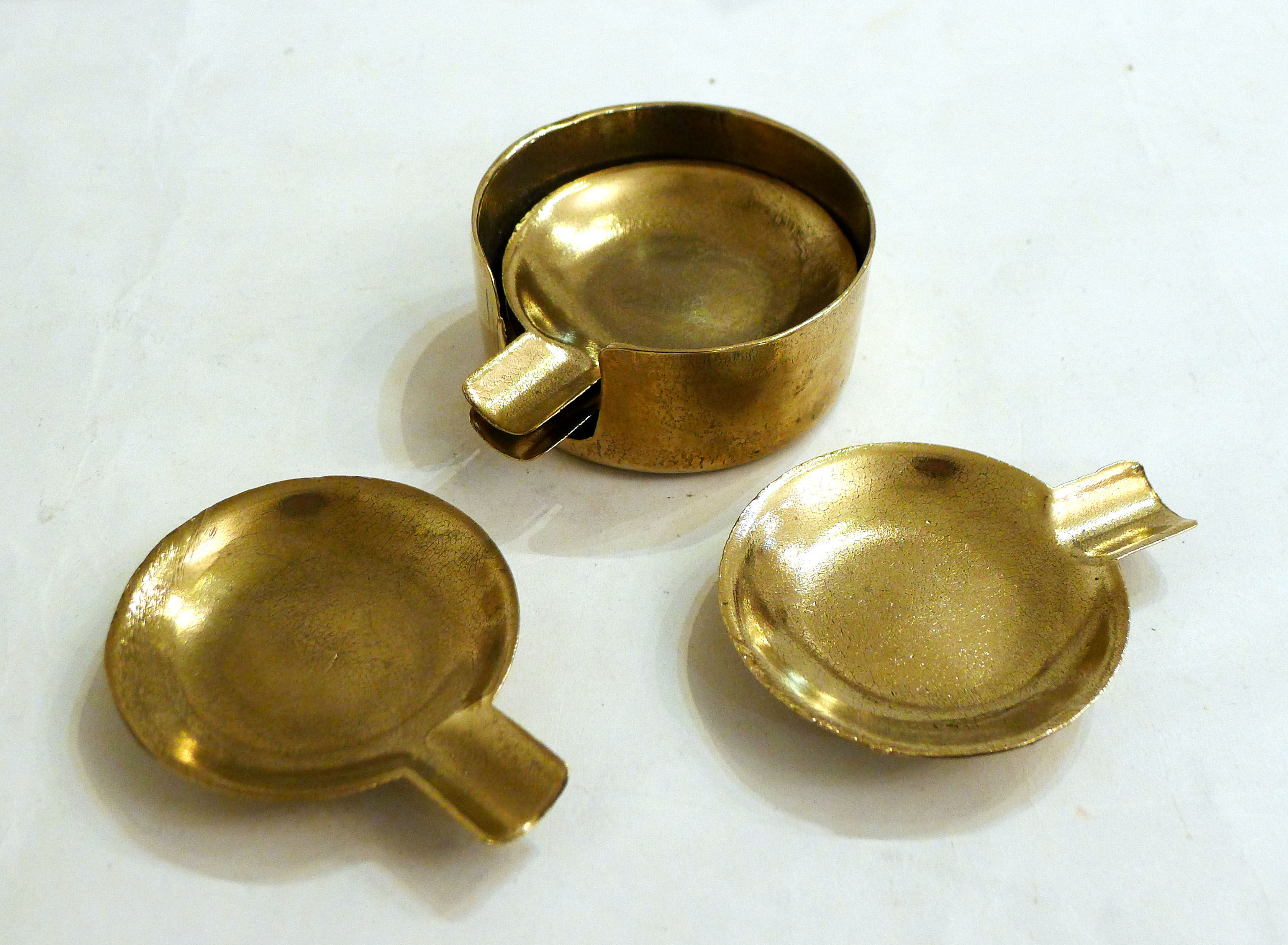 Set of 4 brass stackable ashtrays