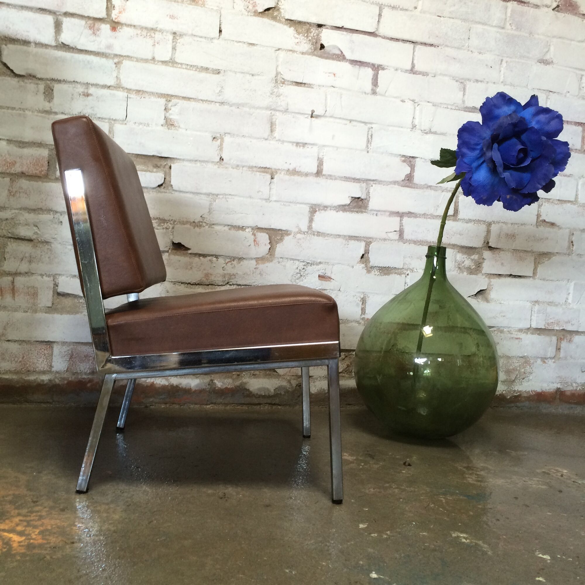 Modernist fireside chair / vintage chrome and skai armchair