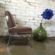 Modernist fireside chair / vintage chrome and skai armchair