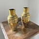 Duo of embossed brass vases