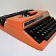 Silver Reed 200 orange metal typewriter made in Japan 70s