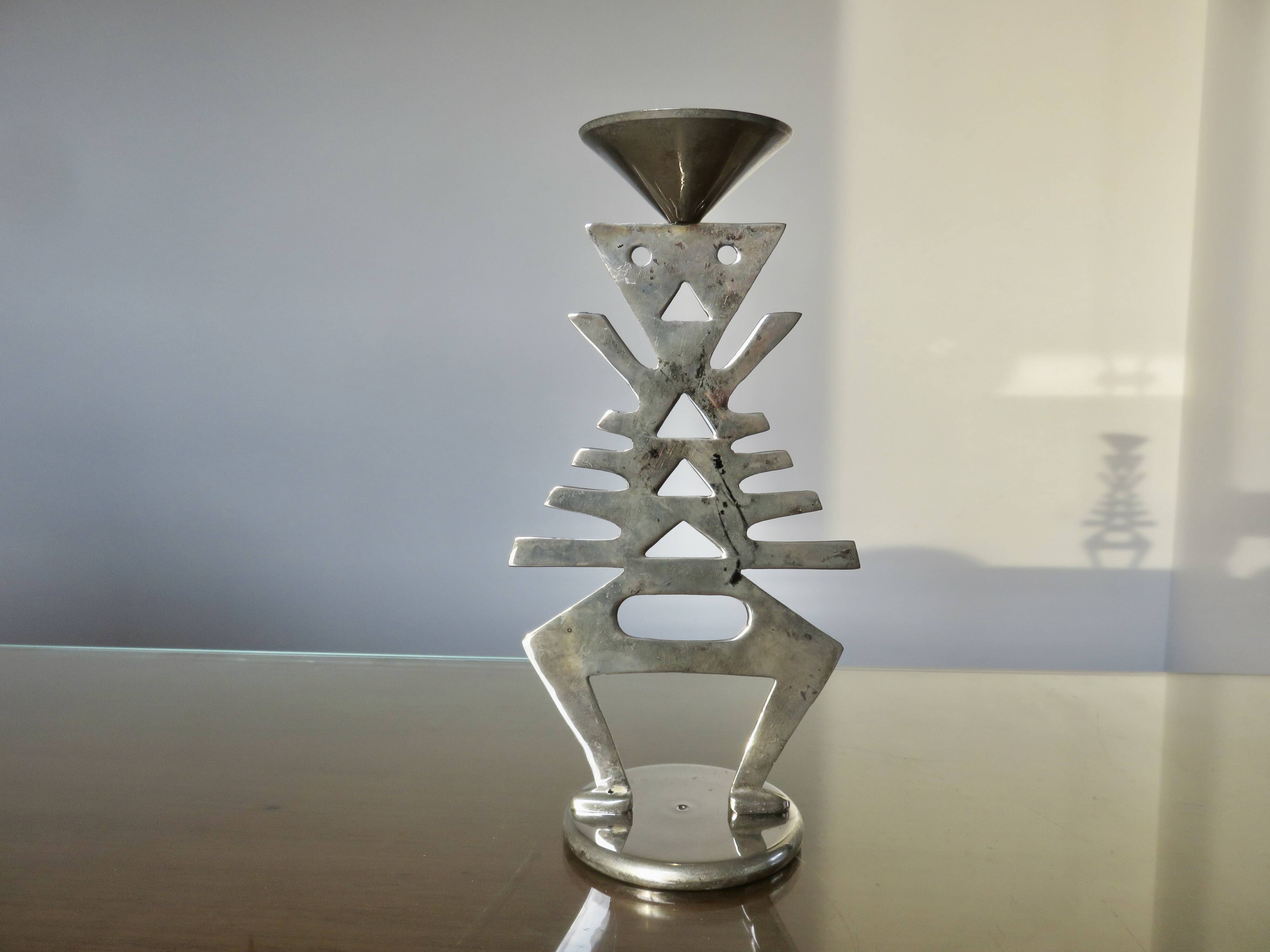 Ethnic “skeleton” candle holder in nickel-plated brass from the 80s