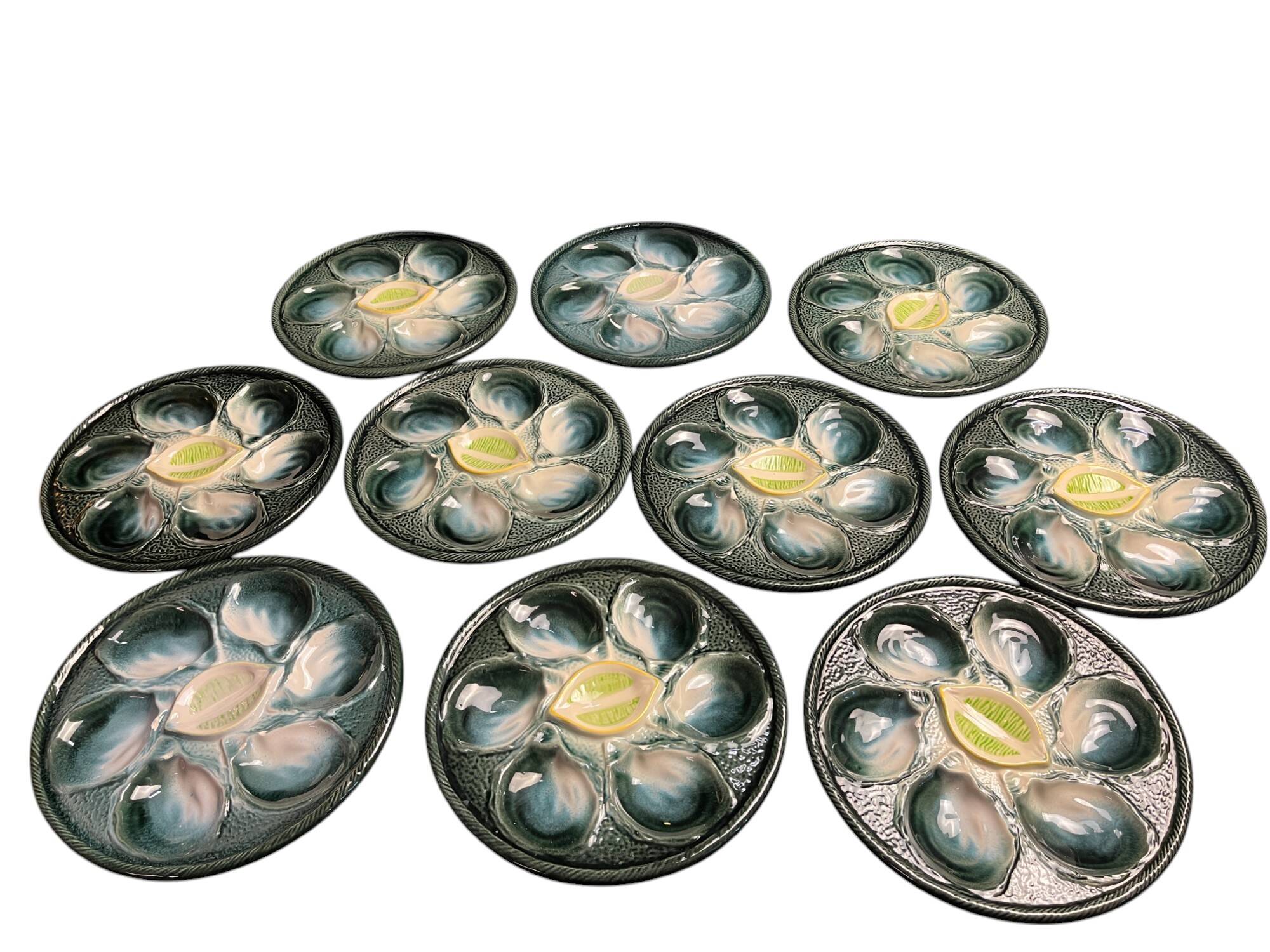Set of 10 Saint Clément oyster barbotine plates circa 1940