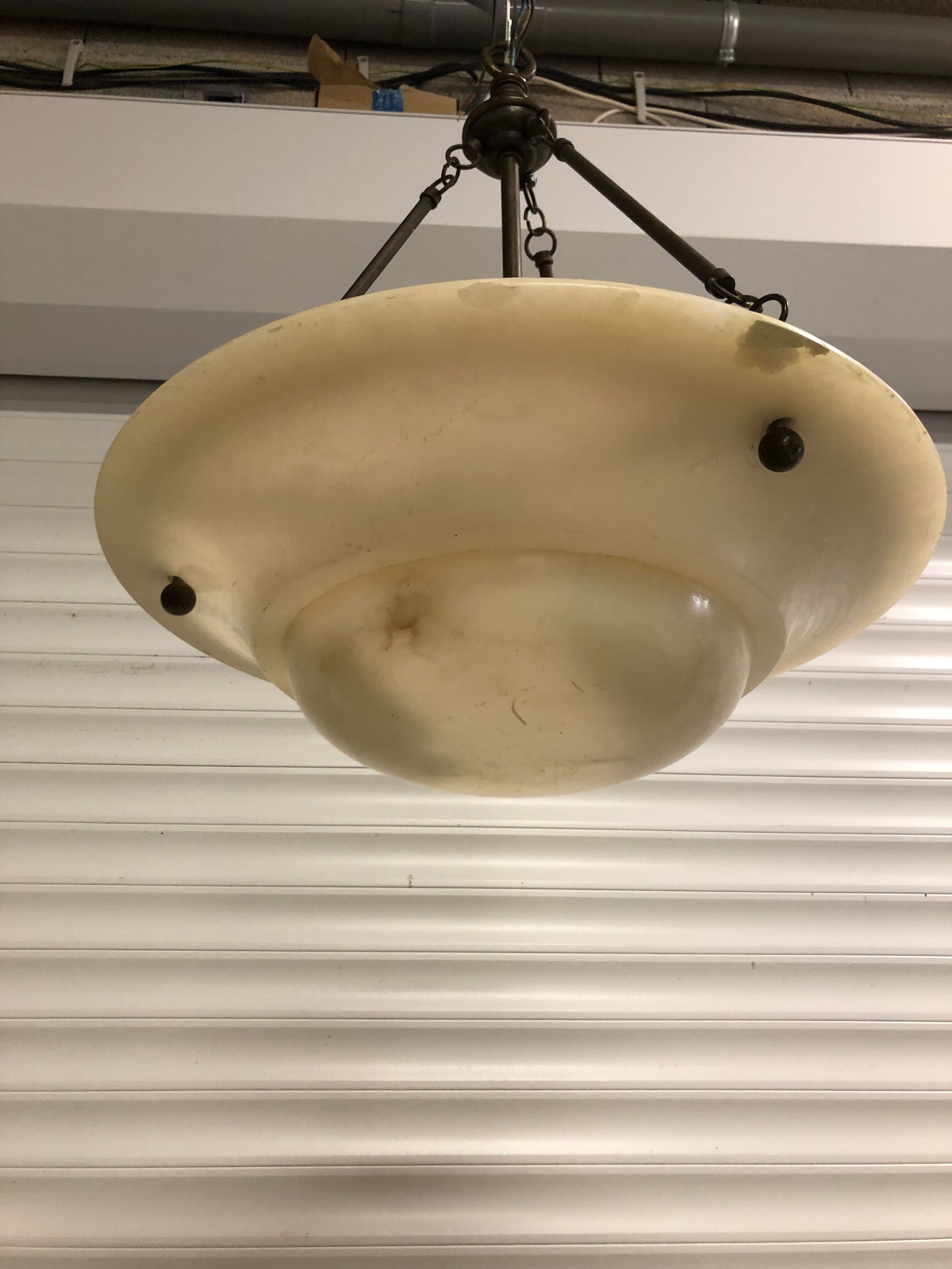 Chandelier in white alabaster and antique brass.