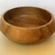 Round wooden pocket emptier