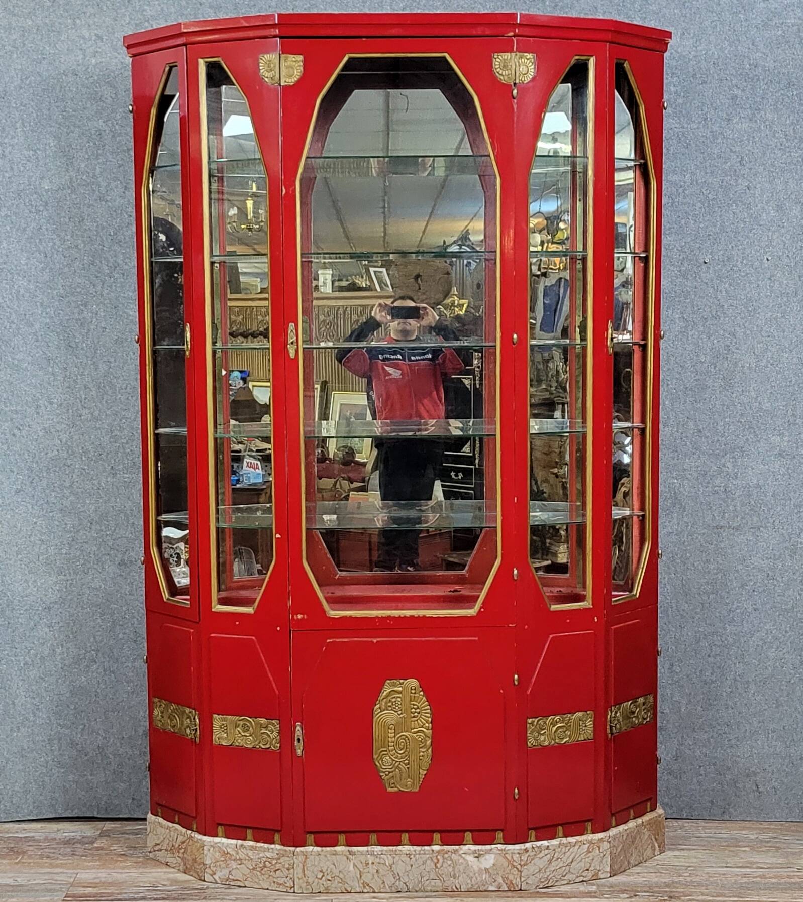 Important Art Deco period bookcase in lacquered wood and gilded bronze