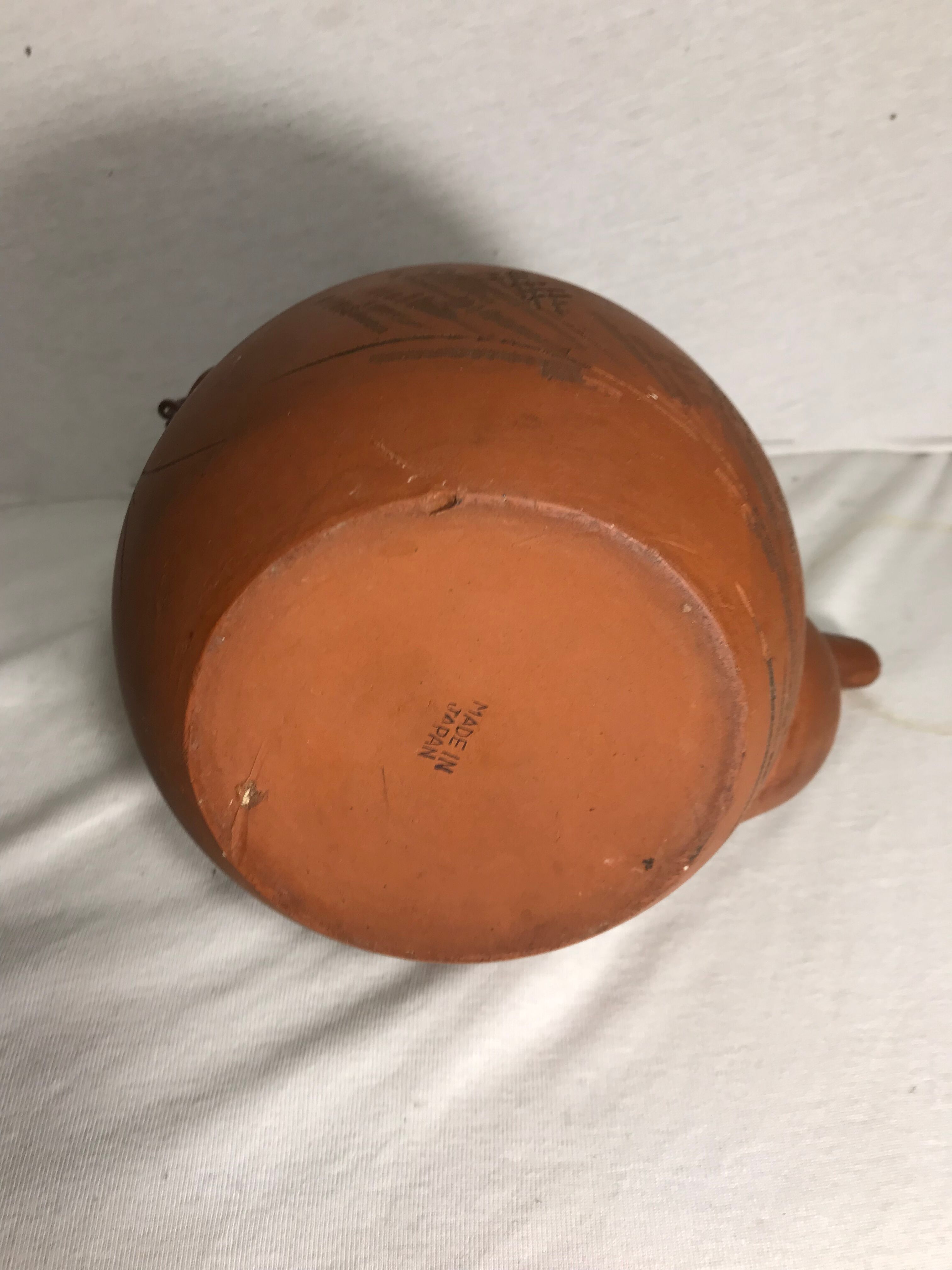 Antique terracotta teapot