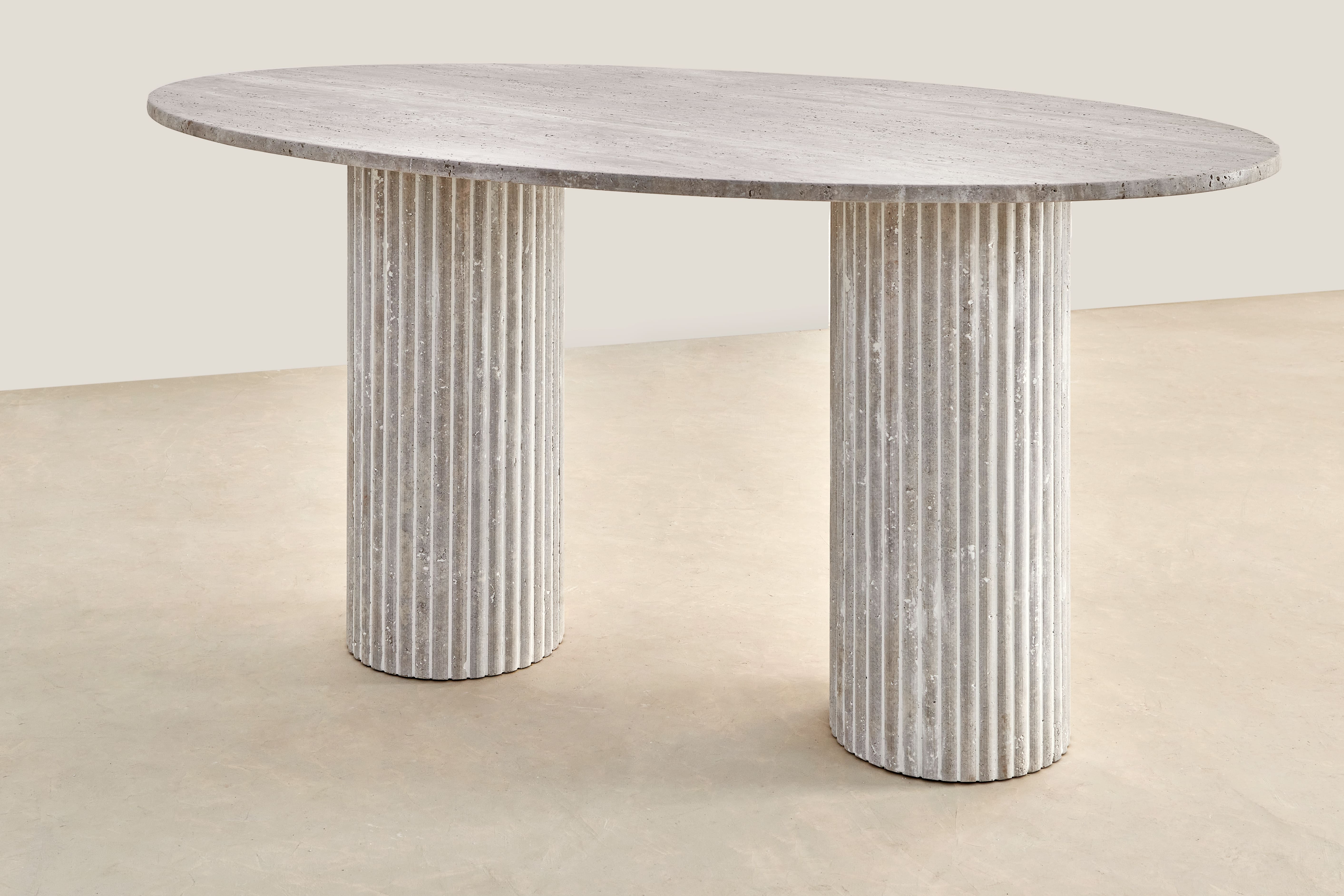 Oval dining table Calypso natural travertine, striated foot 200x100