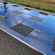 Stainless steel and smoked glass coffee table