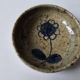 Ceramic bowl emptier with floral motif by suzanne dauliach