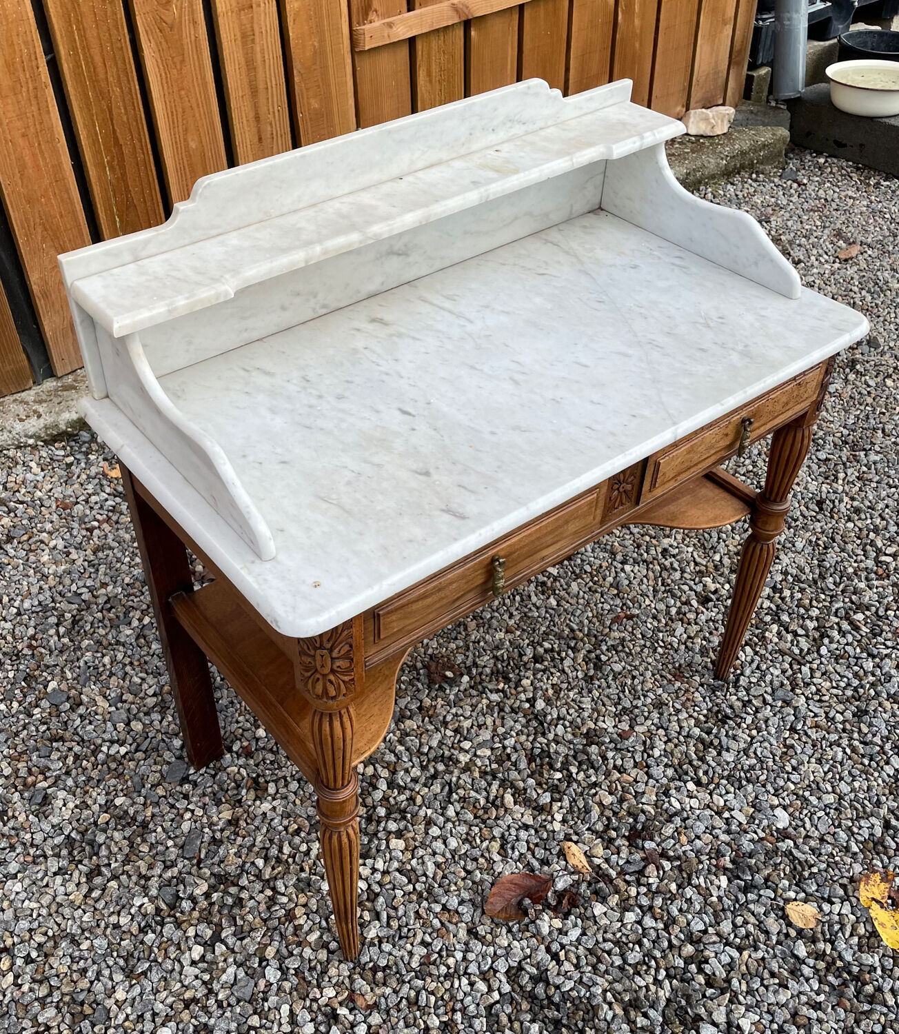 Wood and marble bathroom cabinet