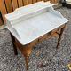 Wood and marble bathroom cabinet