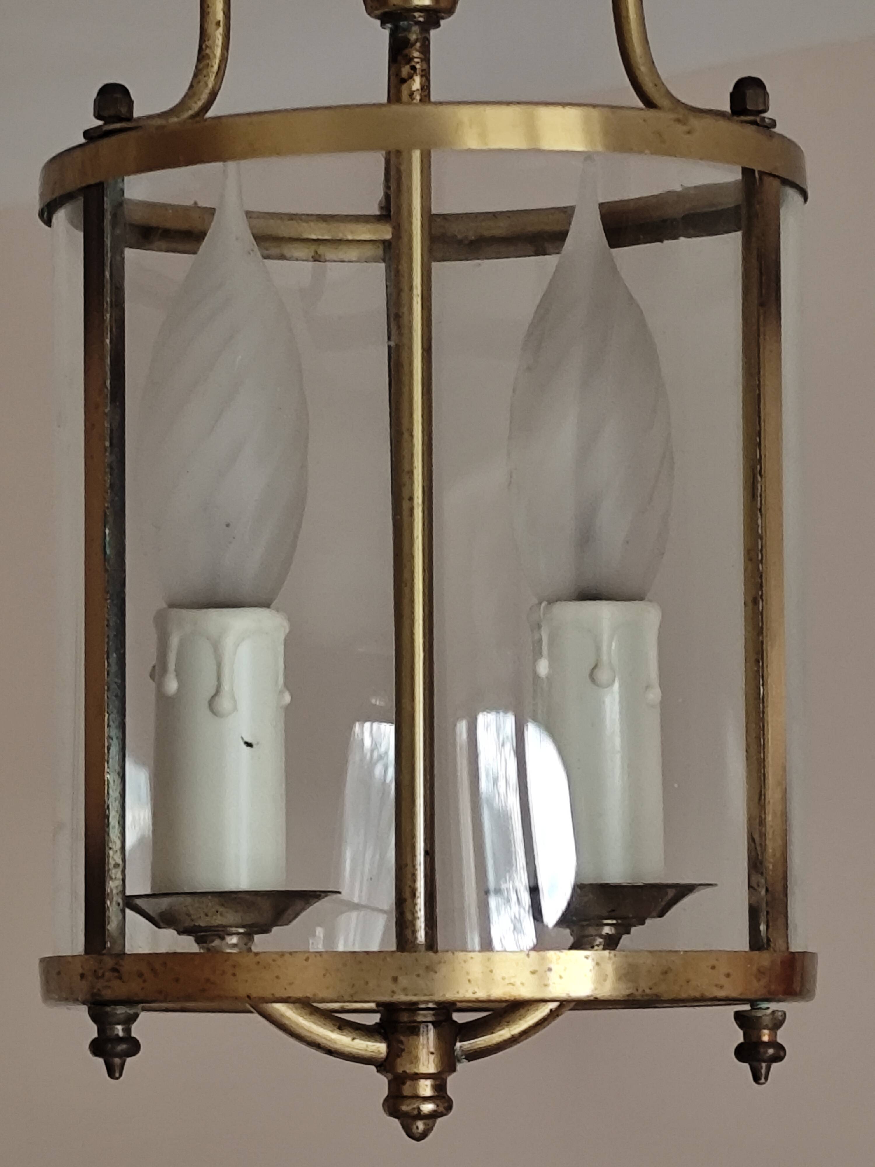 Cylindrical brass and glass lantern in Louis XVI style.