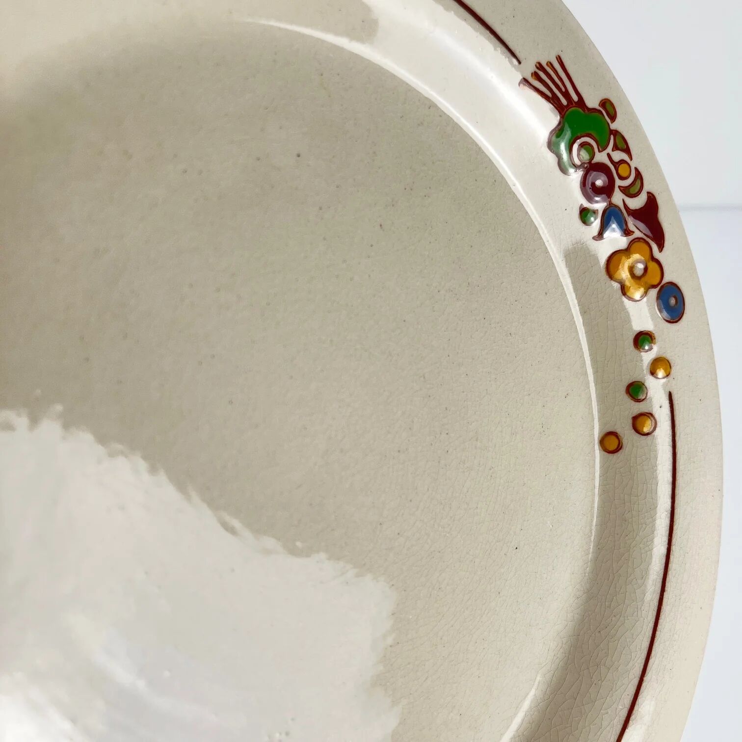 Presentation plate with pedestal Longwy, early 20th century, floral decoration.