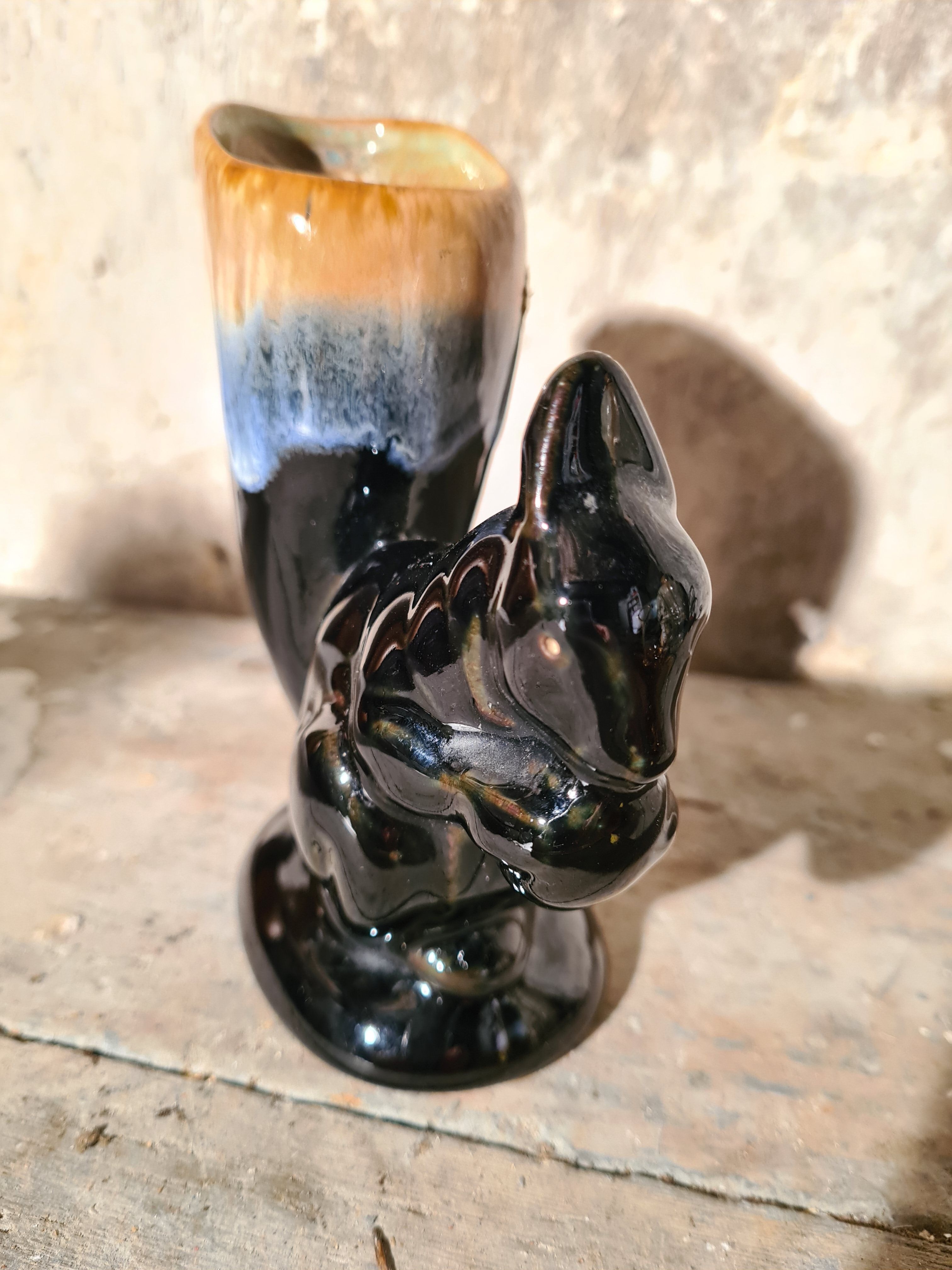 Flaming sandstone squirrel vase