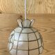 Mother-of-pearl and brass suspension